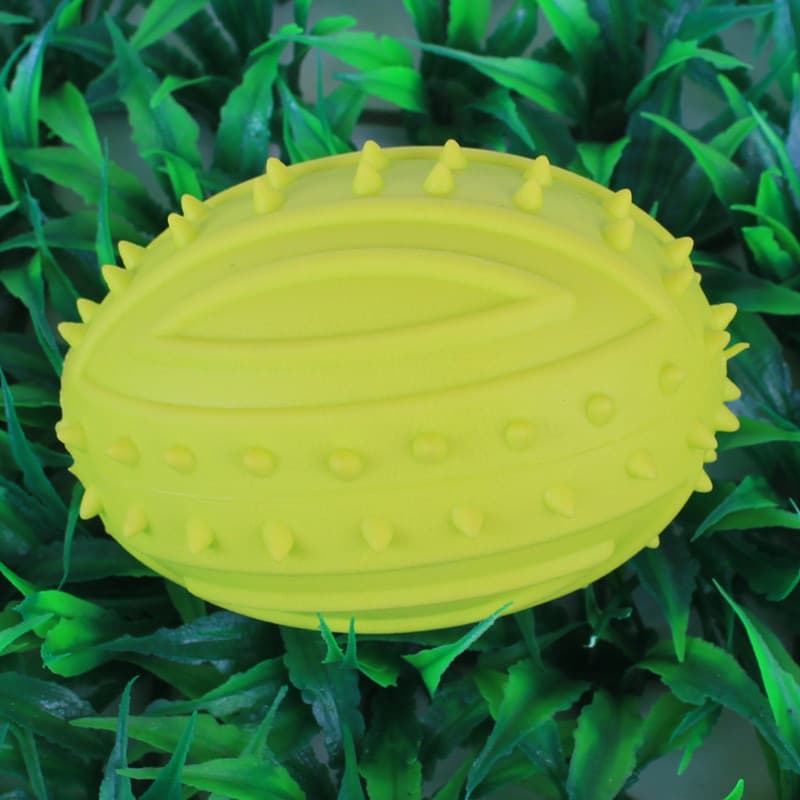 Colorful catnip-infused rugby chew toy made of non-toxic rubber for active pets