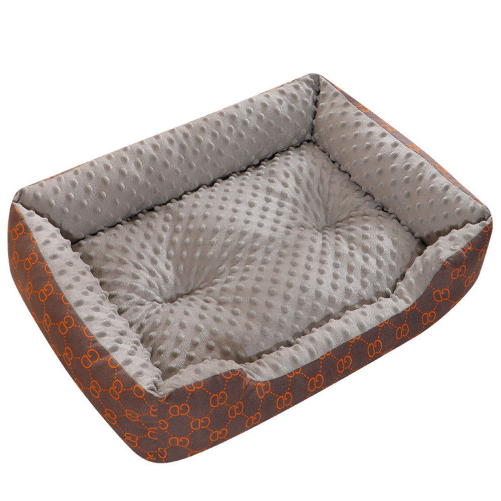 Cat curled up in a cozy rectangular bed for small pets
