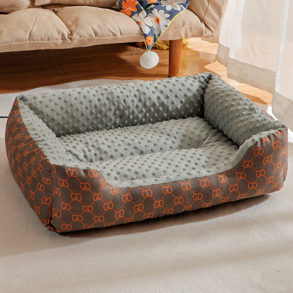 Small dog sleeping in soft pet bed with plush texture
