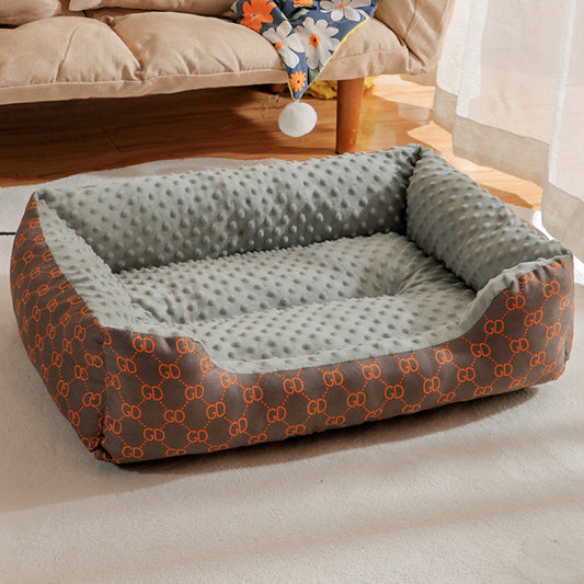 Small dog sleeping in soft pet bed with plush texture
